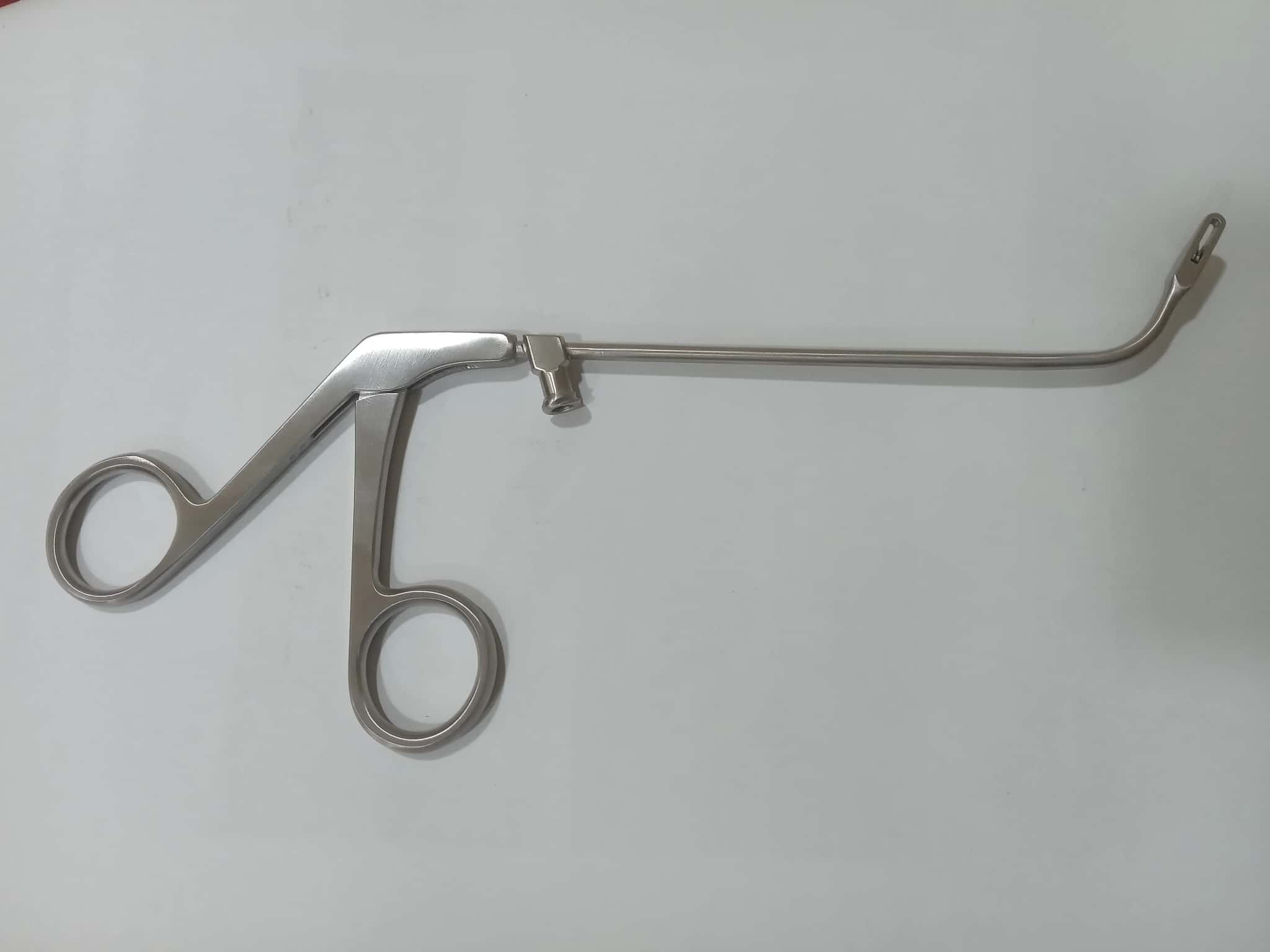Metal ring-handle instrument with curved shaft